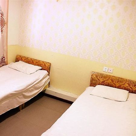 Qingdao Peninsula Four Seasons Business Hotel Экстерьер фото