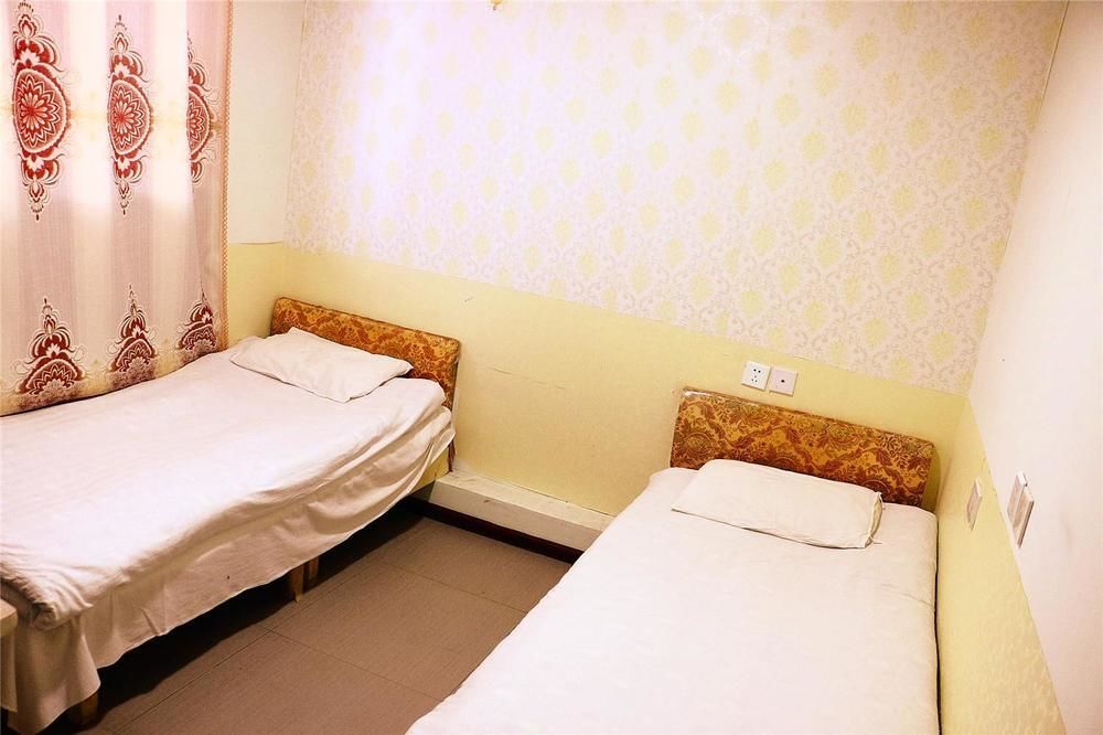 Qingdao Peninsula Four Seasons Business Hotel Экстерьер фото