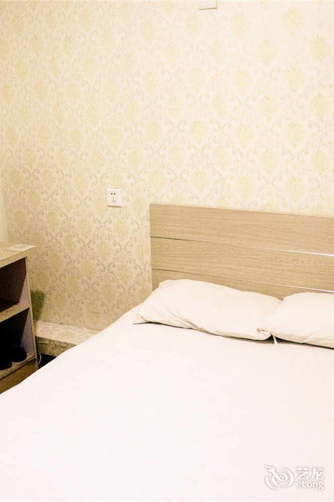 Qingdao Peninsula Four Seasons Business Hotel Экстерьер фото