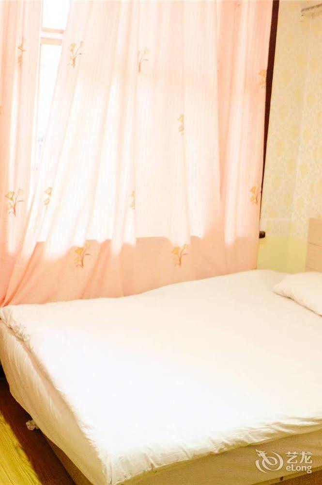 Qingdao Peninsula Four Seasons Business Hotel Экстерьер фото